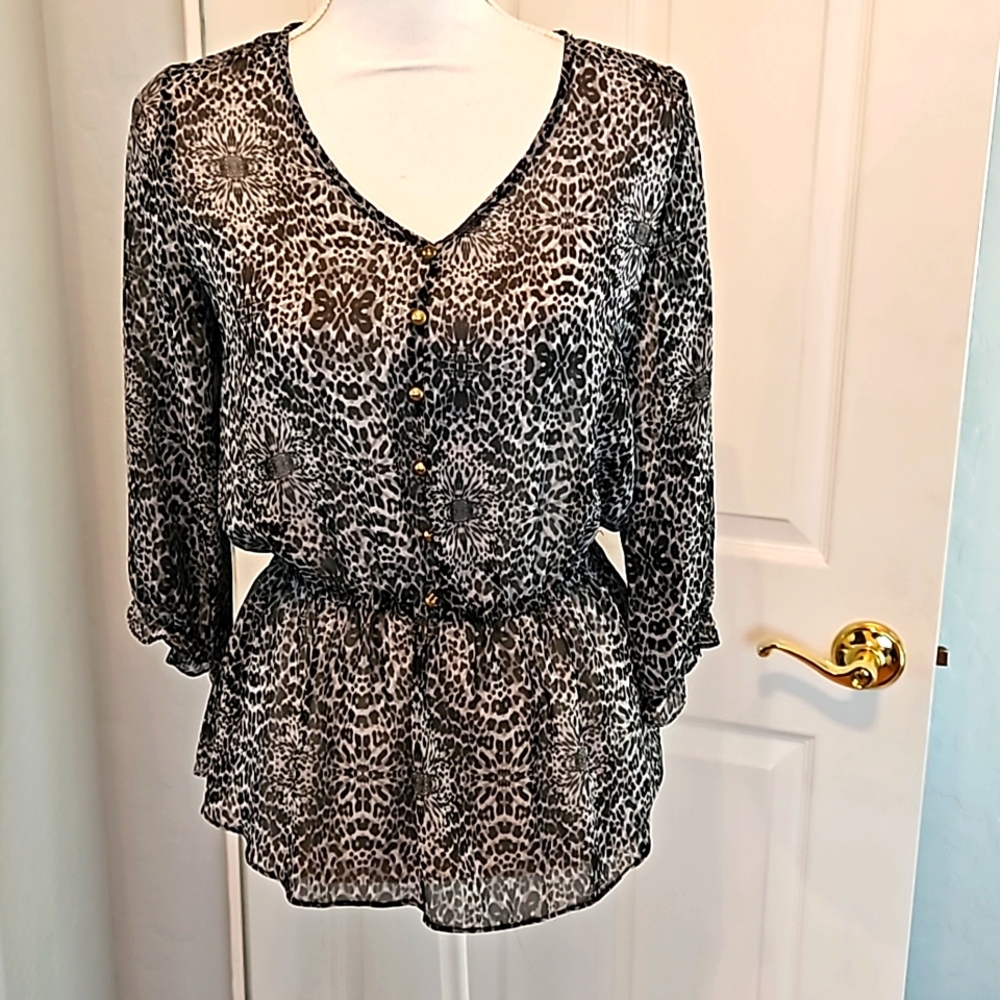 Never been worn!! Black and Gray sheer animal prints top. 3/4 sleeves size Small